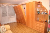 Wardrobe with horizontal bed